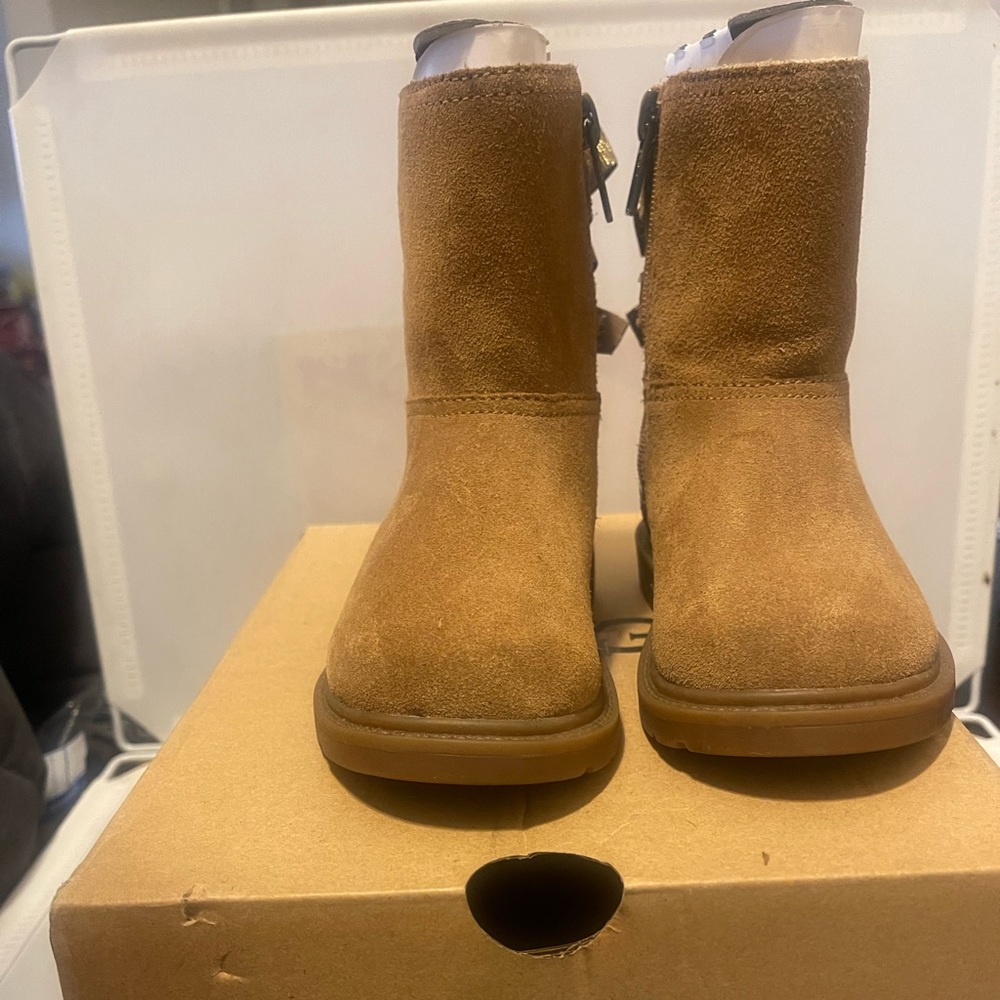 Slightly worn Ugg riding boots